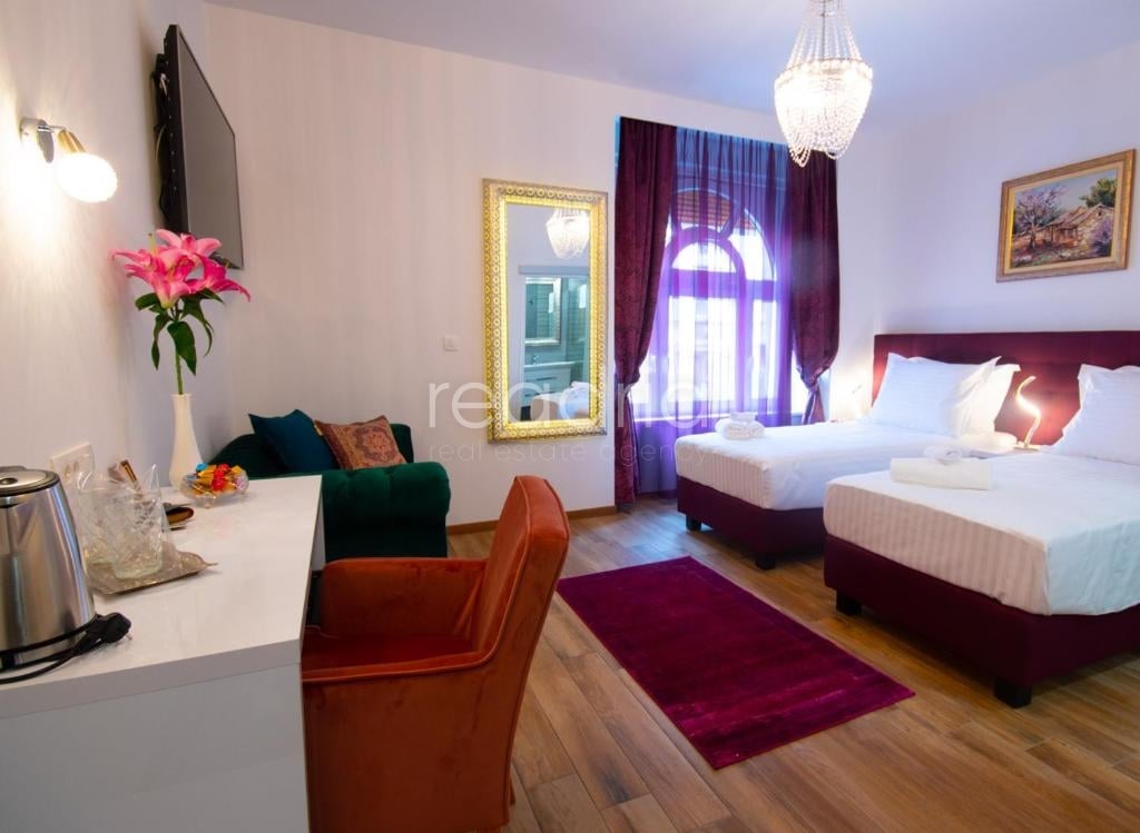 Luksuzne sobe u strogom centru - uhodan posao s visokim povratom — Image 13
